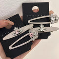 Saturn Orb Gem Motif Hair Clips