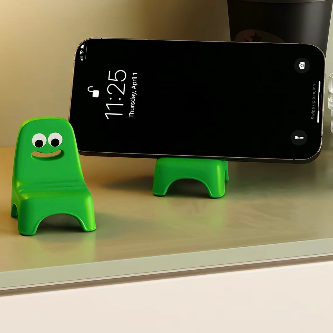 Smirk Stool Phone Stand